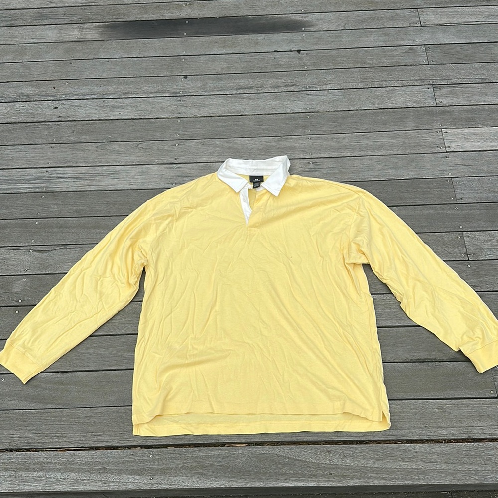 Yellow long sleeve shirt with white collar